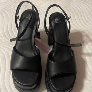 Size 8 1/2 never worn heels